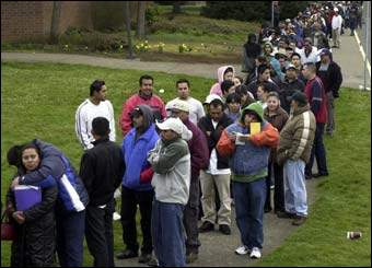 Thousands of Mexicans waited around the perimeter of McKay High School, many since the early hours of the morning, to obtain matricular cards and other assistance from the Mexican Consulate on Saturday.